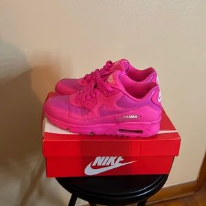 Kids Nikes. Barely worn. Pink size 7y.